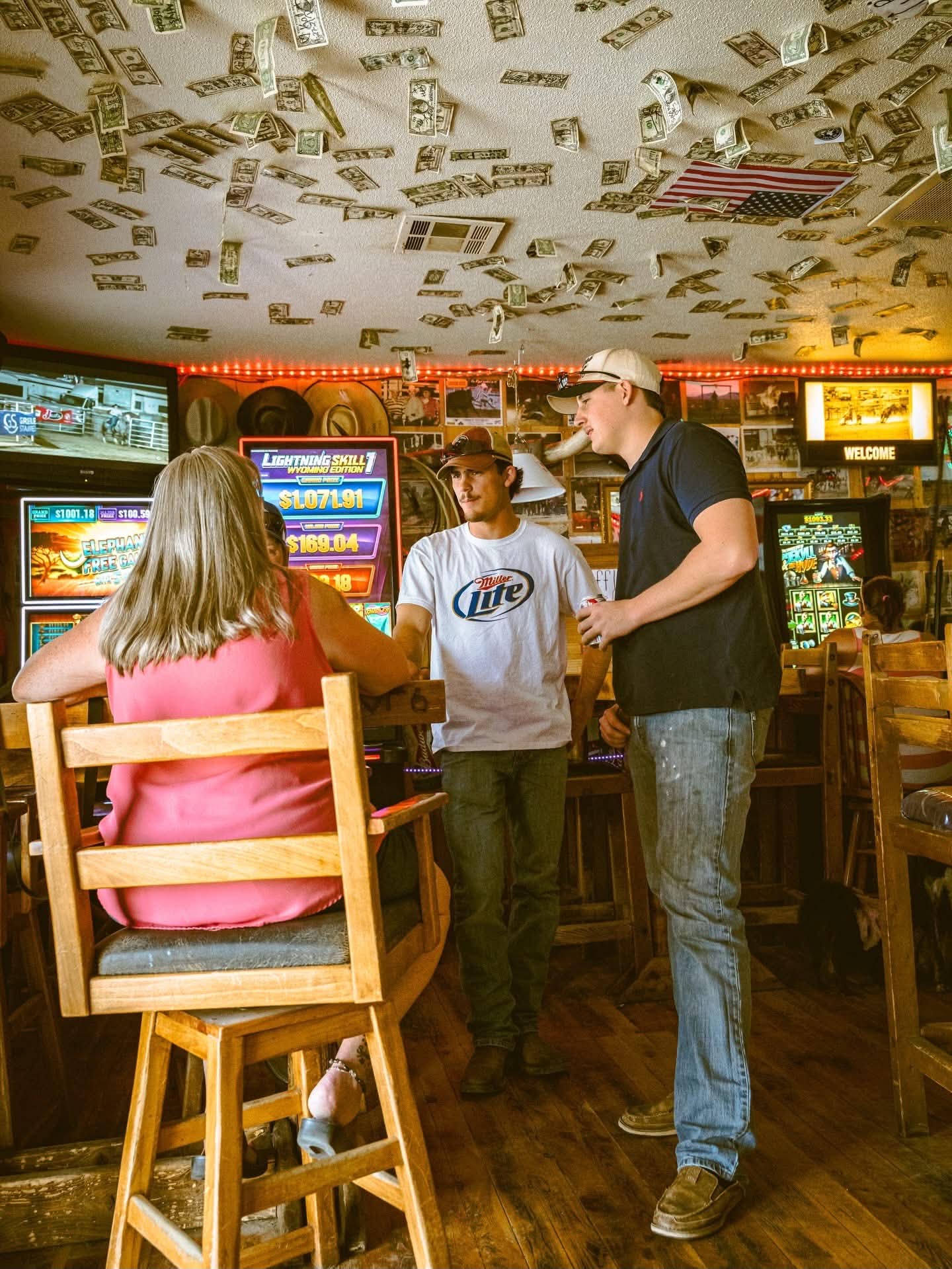 Dollar bills on the ceiling