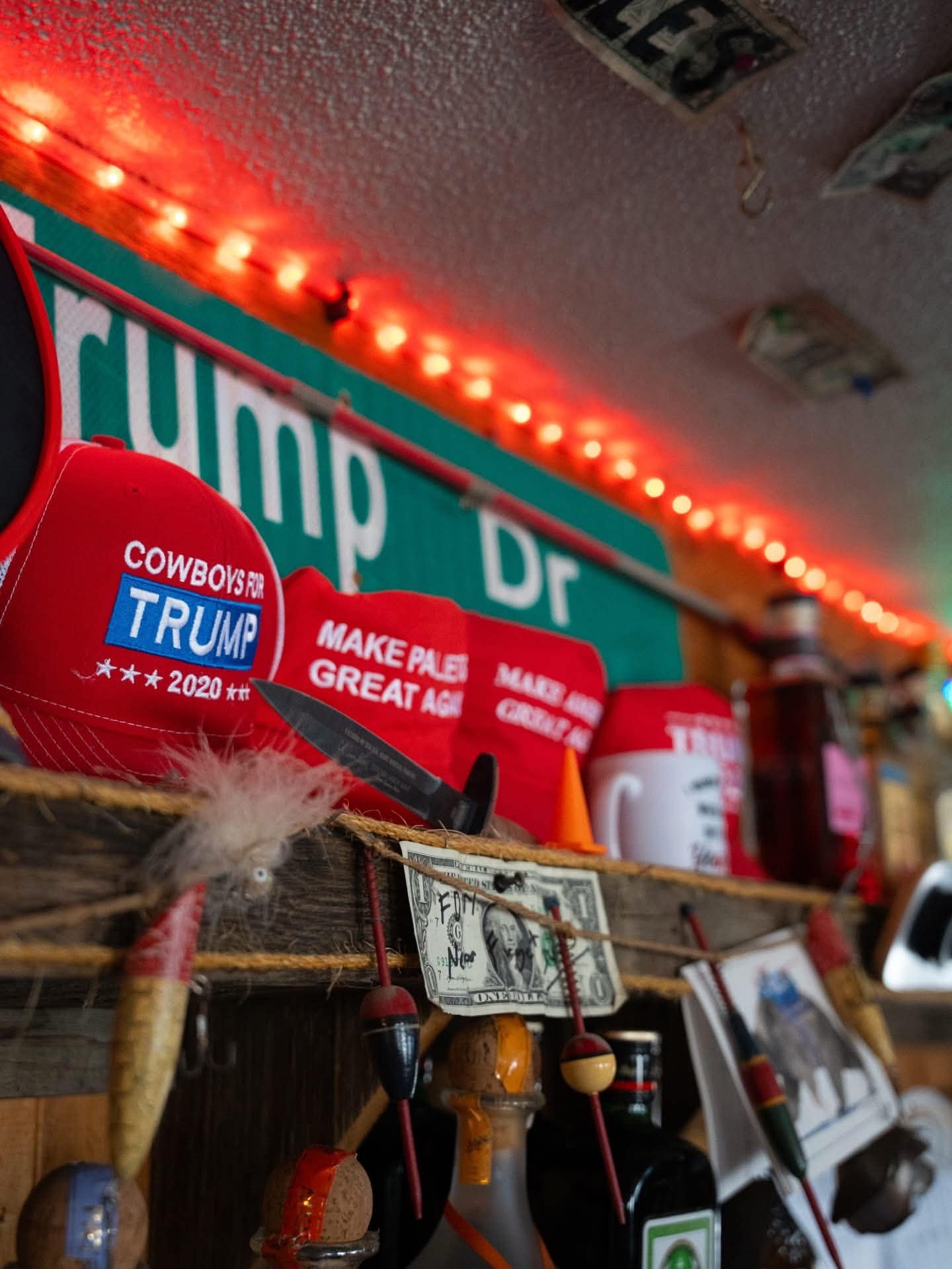 Hats and memorabilia above the bar